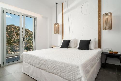 En eller flere senge i et værelse på Stella Luxury Apartments