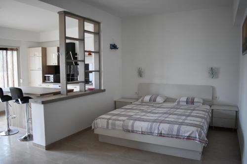 Vuode tai vuoteita majoituspaikassa Relax & Enjoy - Marcana Apartments