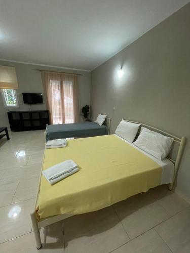 Llit o llits en una habitació de Apricus Apartments