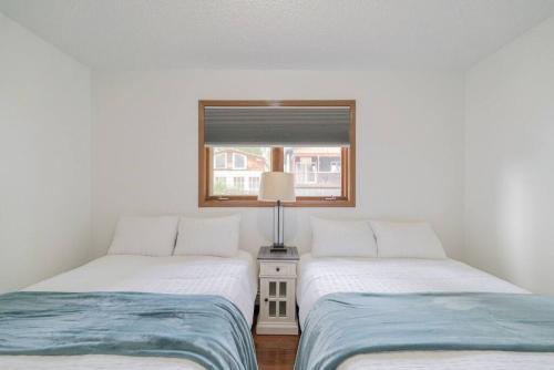 A bed or beds in a room at The Western Hale Hideaway