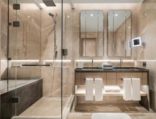 a bathroom with a shower and a sink at Address Istanbul in Istanbul