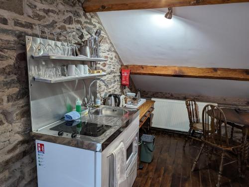 a kitchen with a sink and a counter top at Lake View Country House in Grasmere