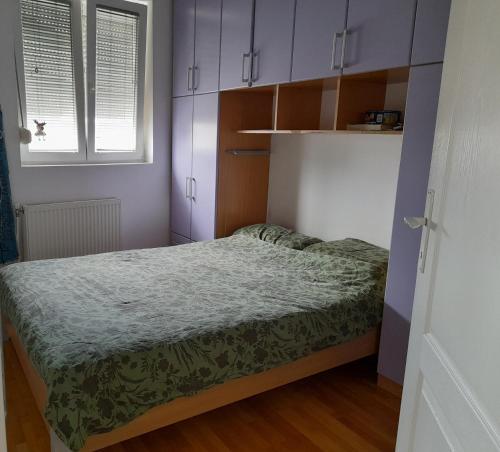 Postel nebo postele na pokoji v ubytování Family Apartman