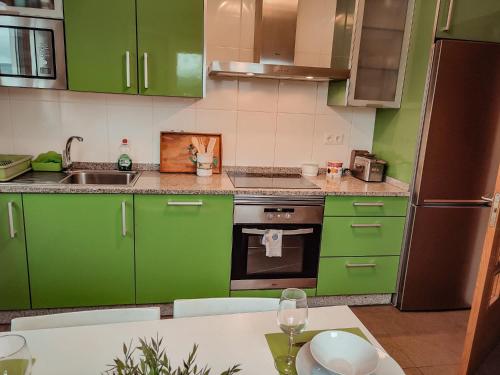 Kuchyň nebo kuchyňský kout v ubytování Casa Fontao, Campo y Playa Abrela
