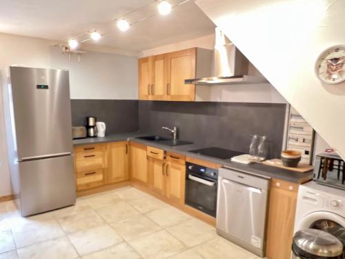 Kuchyň nebo kuchyňský kout v ubytování LA SOIE