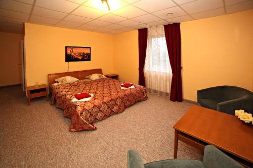 Ένα ή περισσότερα κρεβάτια σε δωμάτιο στο Zemgale