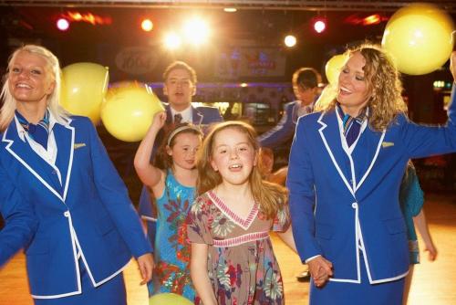 a group of women and a little girl wearing medals at Pontins - Prestatyn Sands Holiday Park in Prestatyn