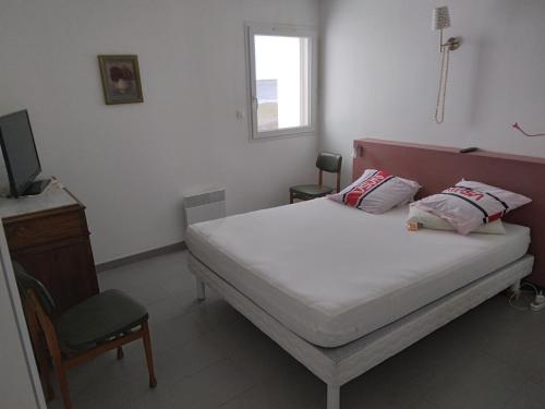 Posteľ alebo postele v izbe v ubytovaní Appartement F3 en bordure de l étang de thau