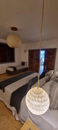 Postel nebo postele na pokoji v ubytování Hotel Rede Beach