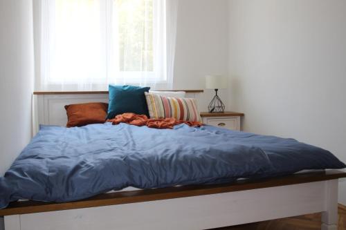 מיטה או מיטות בחדר ב-Art Home Eger