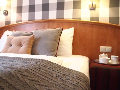 Кровать или кровати в номере Hotel Stare Miasto Old Town
