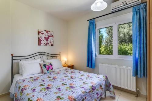 Postel nebo postele na pokoji v ubytování Villa Kastellaki by Villa Plus