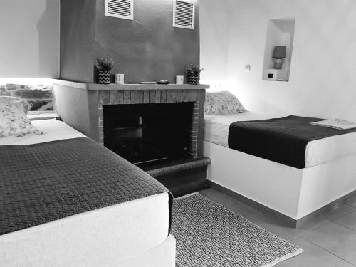 Ένα ή περισσότερα κρεβάτια σε δωμάτιο στο Panagiotas House
