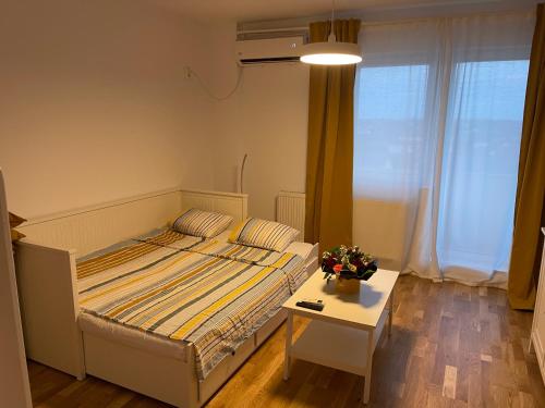 Deluxe Single Room Apartament tesisinde bir odada yatak veya yataklar