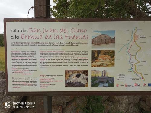 a sign for a interpretive sign at a park at CASITA AZUL MUÑICO , AVILA in Muñico