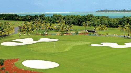 an aerial view of a golf course with two putting greens at Cozy suite at coco Beach , not pets in Rio Grande