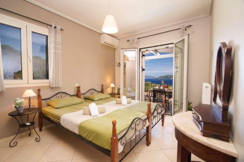 Postel nebo postele na pokoji v ubytování Villa Melissani by Villa Plus