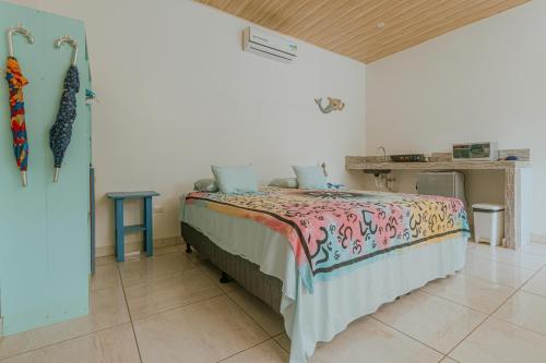 Postel nebo postele na pokoji v ubytování COCO Beach Village