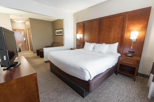 Ένα ή περισσότερα κρεβάτια σε δωμάτιο στο Rapid River Lodge
