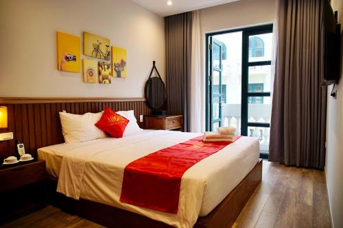 Postel nebo postele na pokoji v ubytování Amorii Hotel