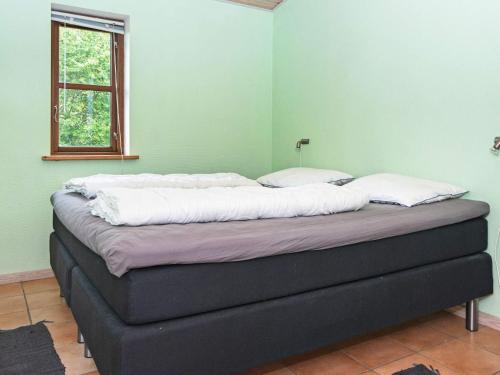 מיטה או מיטות בחדר ב-Holiday home Hemmet CCXLVII