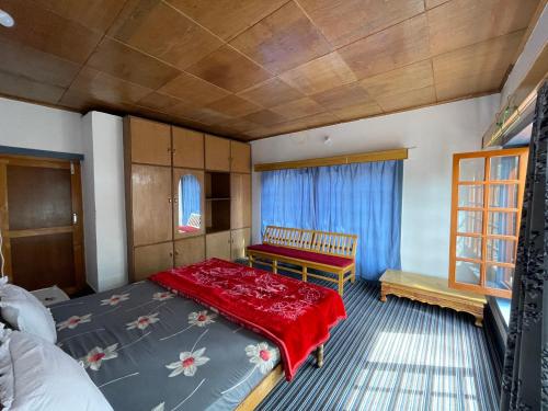 Postel nebo postele na pokoji v ubytování Saiman Guest House