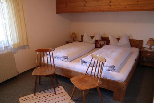 Un pat sau paturi într-o cameră la Haus Thaler