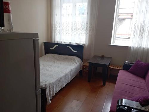 Llit o llits en una habitació de Apartment in OLD Batumi