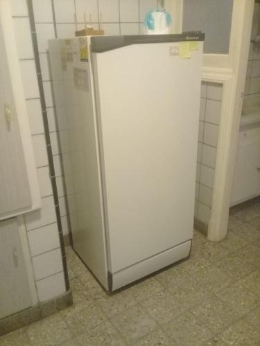 a white refrigerator sitting in a kitchen at Playa Bristol Vista al mar in Mar del Plata