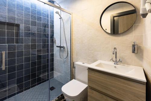 Kúpeľňa v ubytovaní Apartamentos El Patio, Plaza Mayor Trujillo