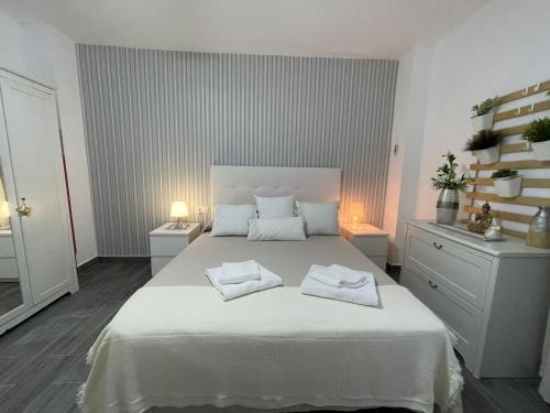 Posteľ alebo postele v izbe v ubytovaní Irina Playa, Apartamentos Living Sur