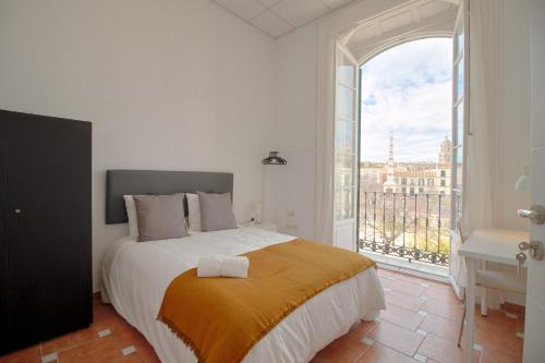 Posteľ alebo postele v izbe v ubytovaní C67 - Shiny 6 Bedrooms in Plaza de la Merced