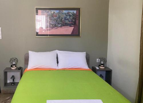 En eller flere senger på et rom på Kissamos Nice Apartment1