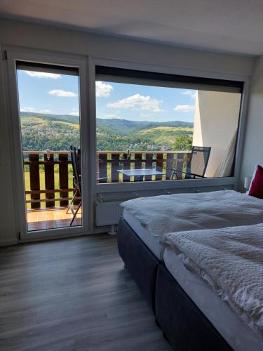 Postel nebo postele na pokoji v ubytování Loreley Lounge II