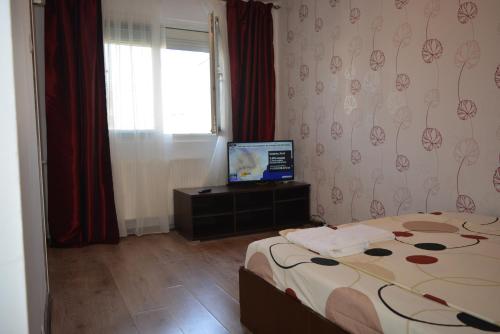 Televisor o centre d'entreteniment de Iulia Studio 9