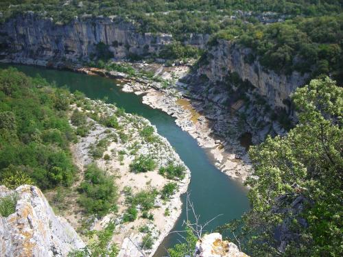 an aerial view of a river in a canyon at Studio en plein centre des Vans in Les Vans