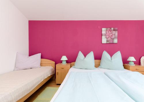 Postel nebo postele na pokoji v ubytování Apartments Damir