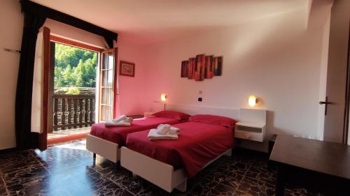 Postel nebo postele na pokoji v ubytování Hotel Edelweiss
