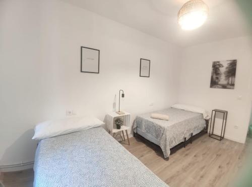 Postel nebo postele na pokoji v ubytování Apartamento Cameros