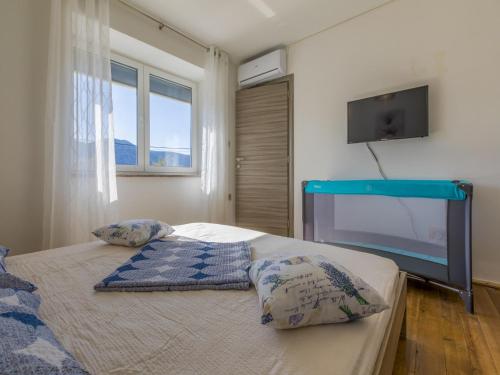 Postel nebo postele na pokoji v ubytování Villa Odiseja