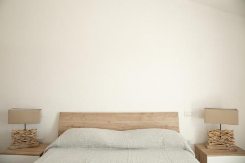 Postel nebo postele na pokoji v ubytování Pula Residence - Via Delle Rose