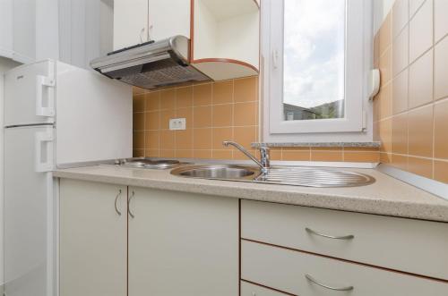 Η κουζίνα ή μικρή κουζίνα στο Apartments Marija