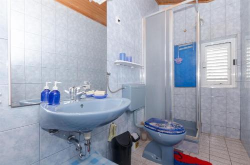 Kúpeľňa v ubytovaní Apartments Franciska