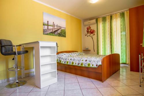 Katil atau katil-katil dalam bilik di Apartments Edo