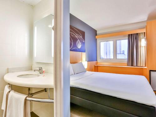ibis Goiâniaにあるベッド