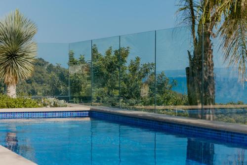 Kolam renang di atau dekat dengan Villa Bloomhill Escape