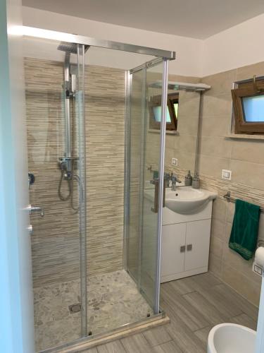 a bathroom with a shower and a sink at La Casetta di Anna, Terni in Terni