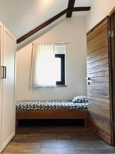 Ένα ή περισσότερα κρεβάτια σε δωμάτιο στο Mulina River Lodge
