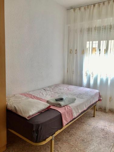 Postel nebo postele na pokoji v ubytování Apartamento Torregrosa