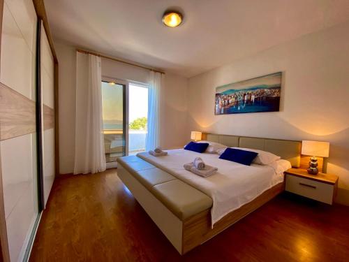 Een bed of bedden in een kamer bij Apartment Marina